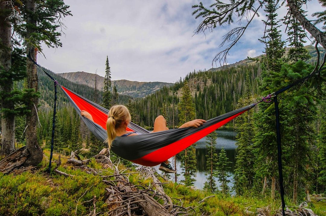 who-we-are woman-on-hammock-near-to-river-kytt8l5jlds